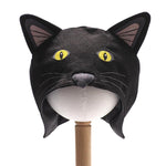 Front view of the black cat hat on a stand against a plain white background.