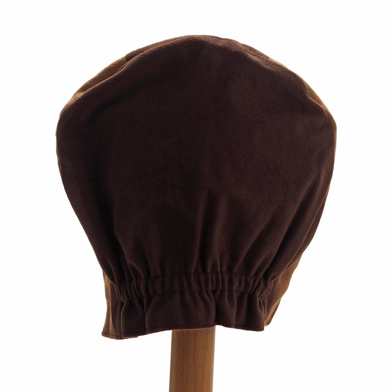 Back view of the brown duck hat on a stand against a white background.