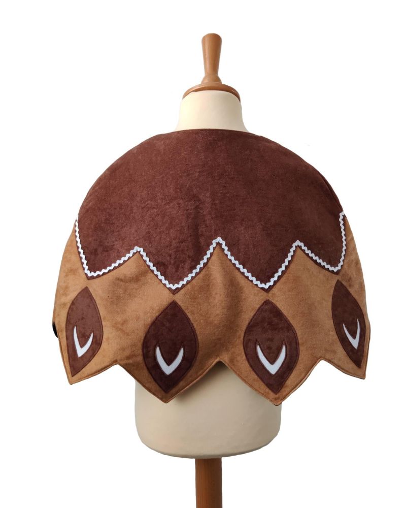 Back view of the brown feathered cape on a stand against a white background.