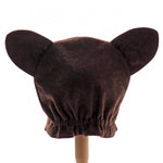 Back view of the brown bear hat on a stand against a plain white background.
