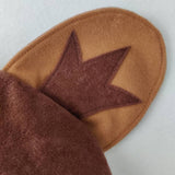 Ear on the brown bear hat.