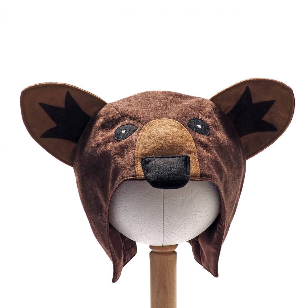 Front view of the brown bear hat on a stand against a plain white background.