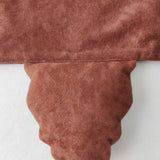 Tail on the brown bear tabard.