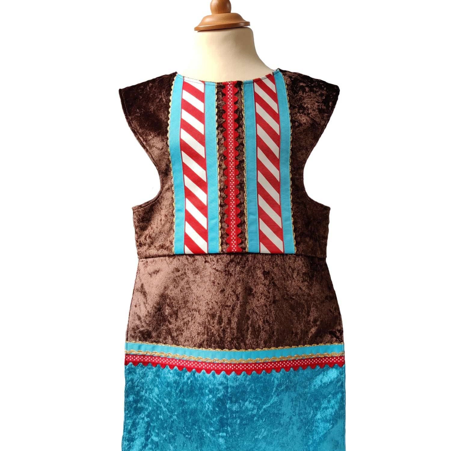 Front view of chocolate royal fairytale tabard on a stand