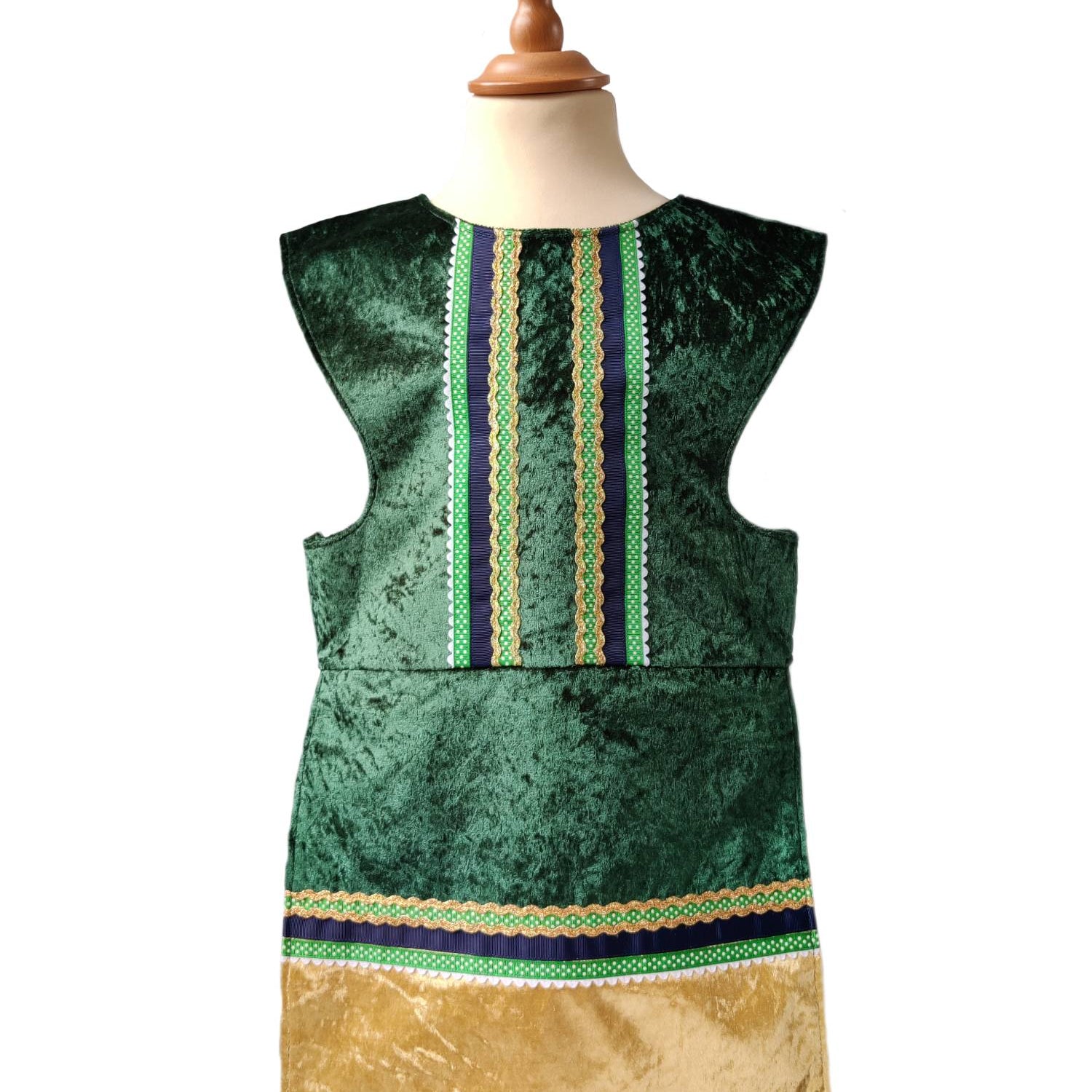 Front view of the emerald royal fairytale tabard on a stand