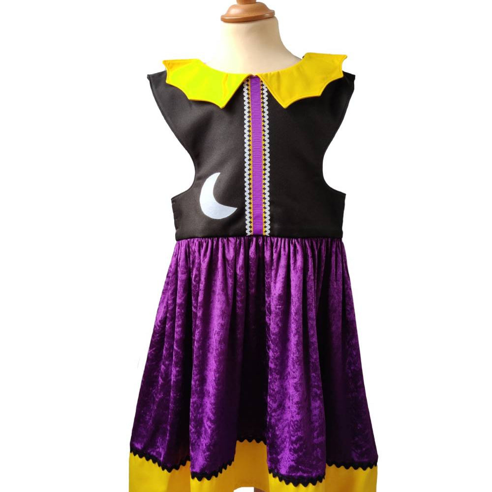 Front view of the enchanted witch dress on a stand against a plain white background.