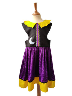Front view of the enchanted witch dress on a stand against a plain white background.