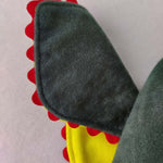 Close up of the front view of the ear on the green troll hat