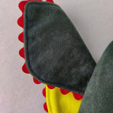 Close up of the front view of the ear on the green troll hat
