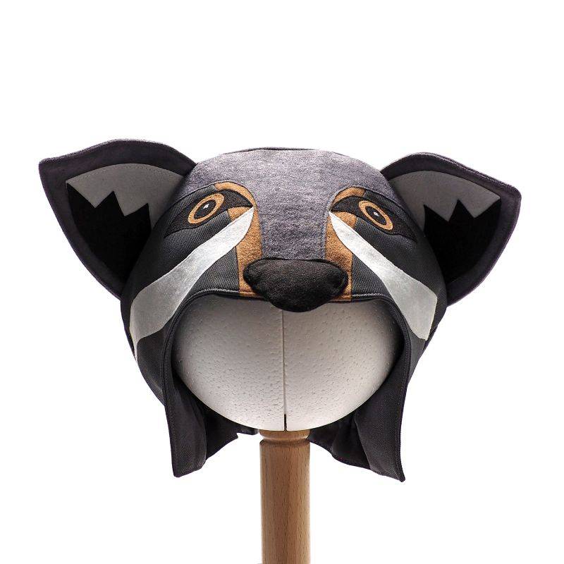 Front view of the grey wolf hat on a stand against a white background.
