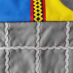 Close up of trimmings decoration on the knight tabard