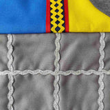 Close up of trimmings decoration on the knight tabard