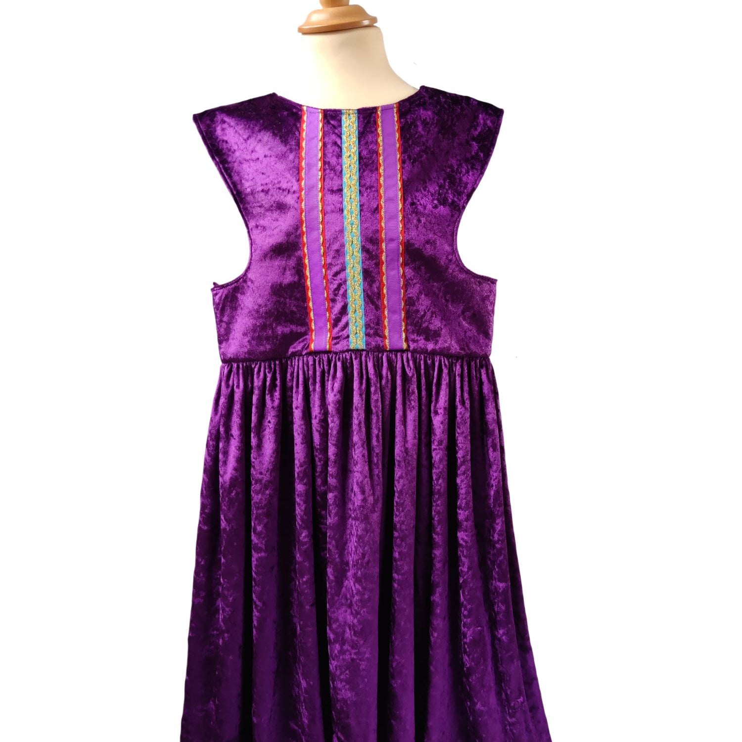 Front view of the purple royal fairytale dress on a stand