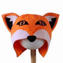 Front view of the red fox hat on a stand against a white background.
