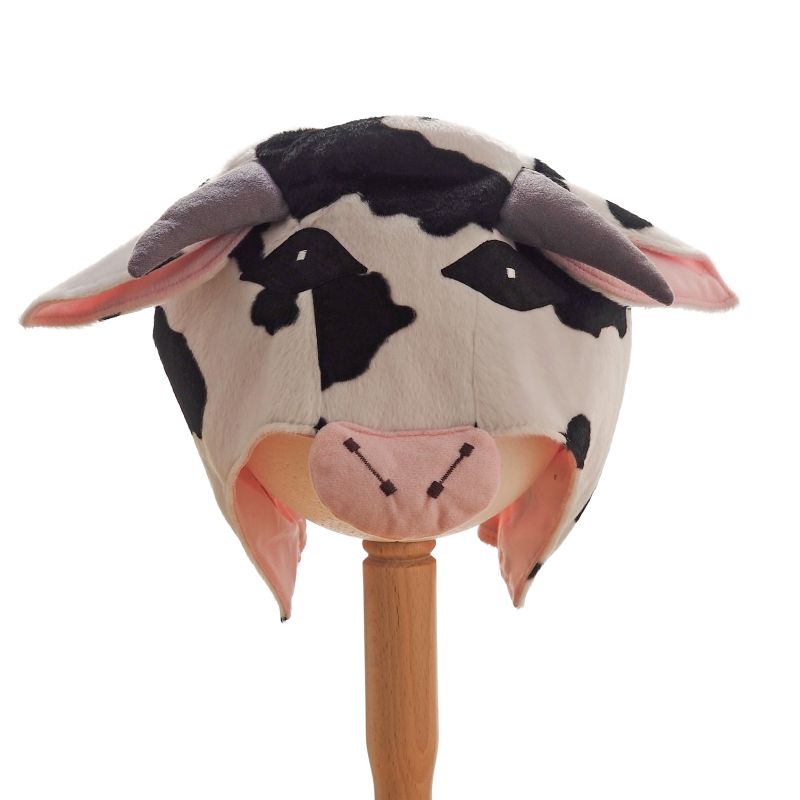 Front view of spotted cow hat on a stand against a white background.